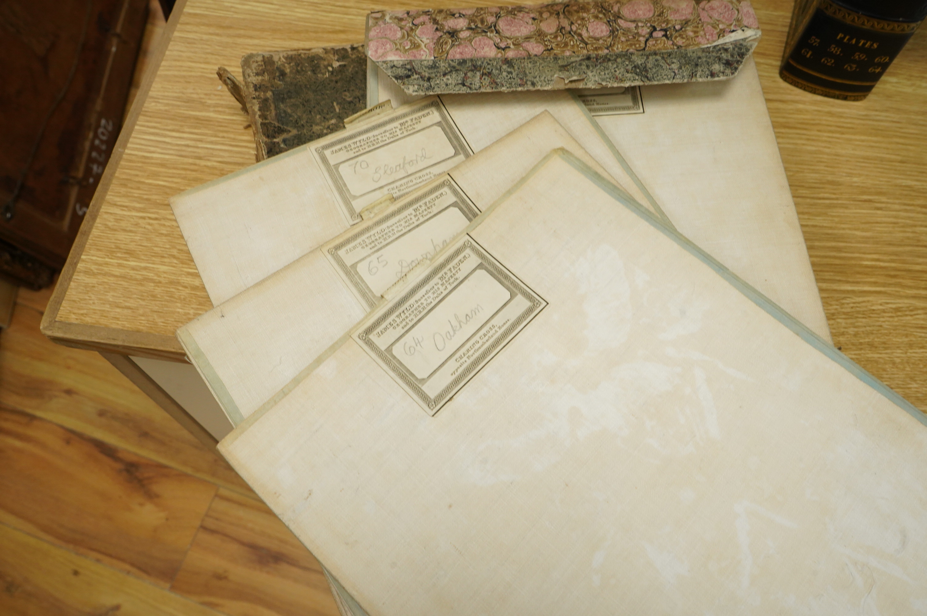 Ordnance Survey maps of Lincolnshire, Rutlandshire, N. Huntingdonshire and W. Norfolk &c., comprising of a set of eight engraved maps mounted on linen and edged in green cotton, including sheet no.s; 64, 65, 69, 70, 83,